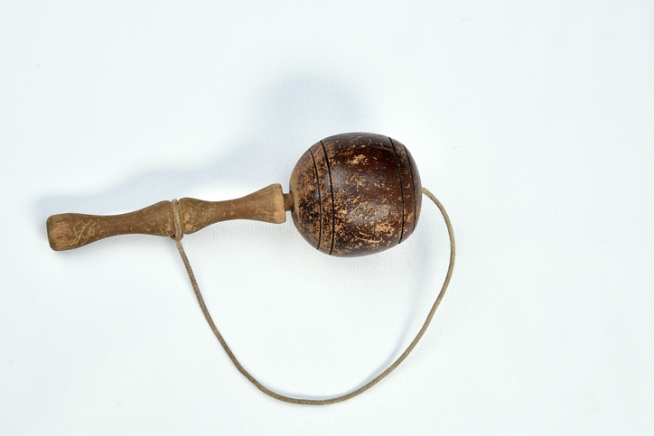 bilboquê, toy, old, brazilian, wooden ball tied by a rope on white background