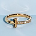 Anel Tiffany T em ouro amarelo 18k com&nbsp;diamantes