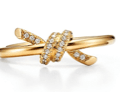 Anel Tiffany Knot em ouro amarelo com&nbsp;diamantes